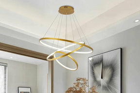 Aurora Dourada Mid – 3 Aros de Luz em Movimento